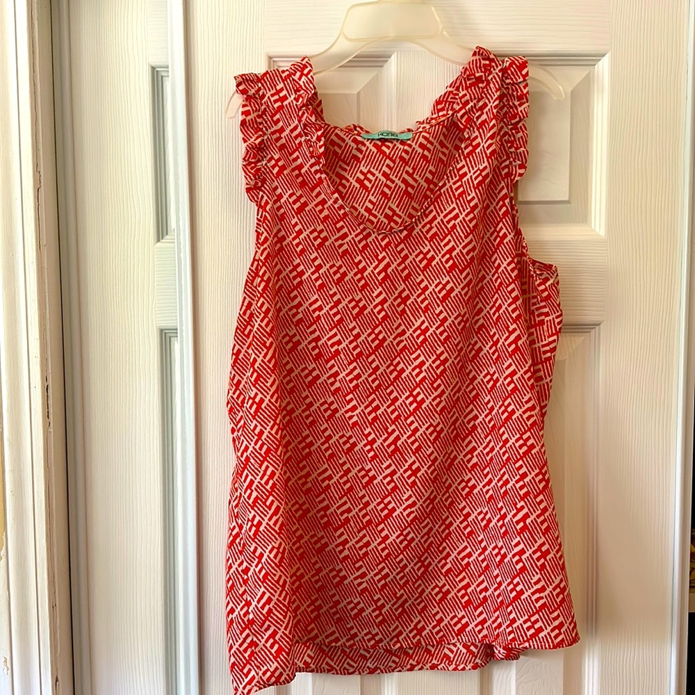 Orange and White patterned sleeveless blouse